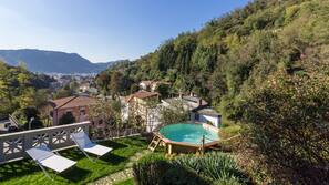 Seasonal outdoor pool, pool umbrellas, pool loungers