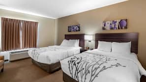 Premium bedding, desk, laptop workspace, blackout drapes
