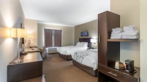 Premium bedding, desk, laptop workspace, blackout drapes