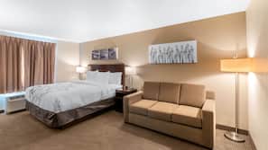 Premium bedding, desk, laptop workspace, blackout drapes