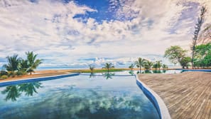 Private beach, white sand, free beach shuttle, beach bar