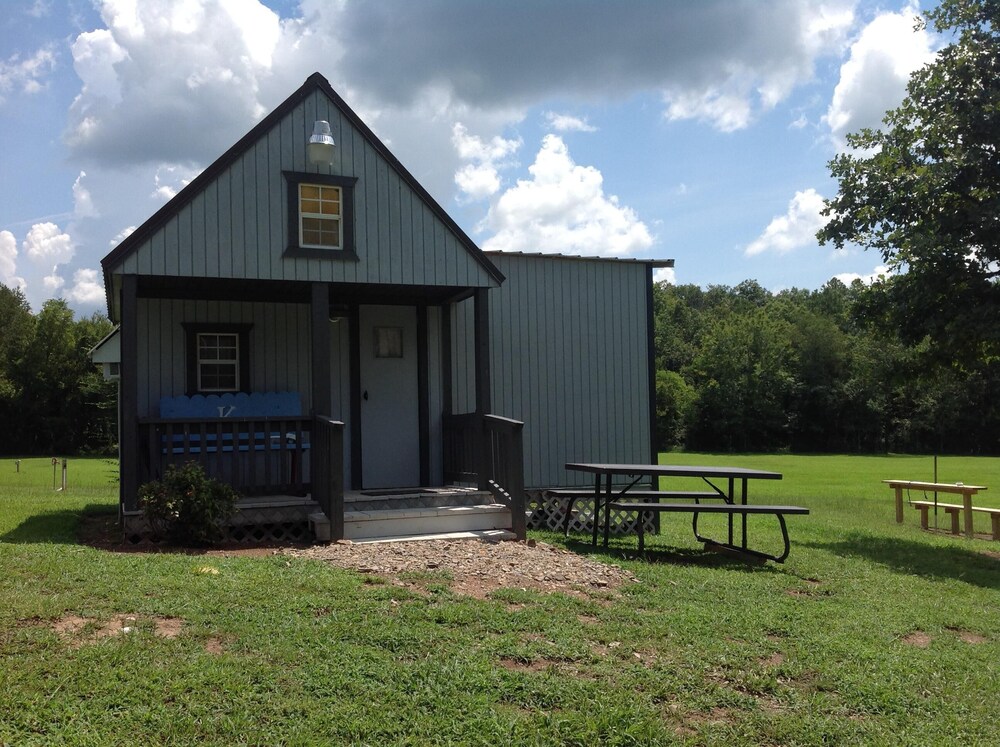A Tiny Camping Cabin Full Of Rustic Country Charm In Sims
