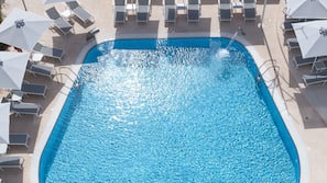 Indoor pool, outdoor pool, pool umbrellas, sun loungers