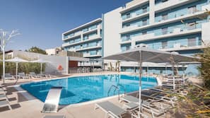Indoor pool, outdoor pool, pool umbrellas, sun loungers