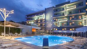 Indoor pool, outdoor pool, pool umbrellas, sun loungers