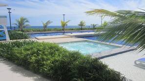 2 outdoor pools, pool loungers