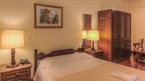 Desk, blackout curtains, free cots/infant beds, free WiFi