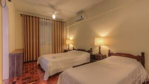Desk, blackout curtains, free cots/infant beds, free WiFi