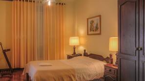 Desk, blackout curtains, free cots/infant beds, free WiFi