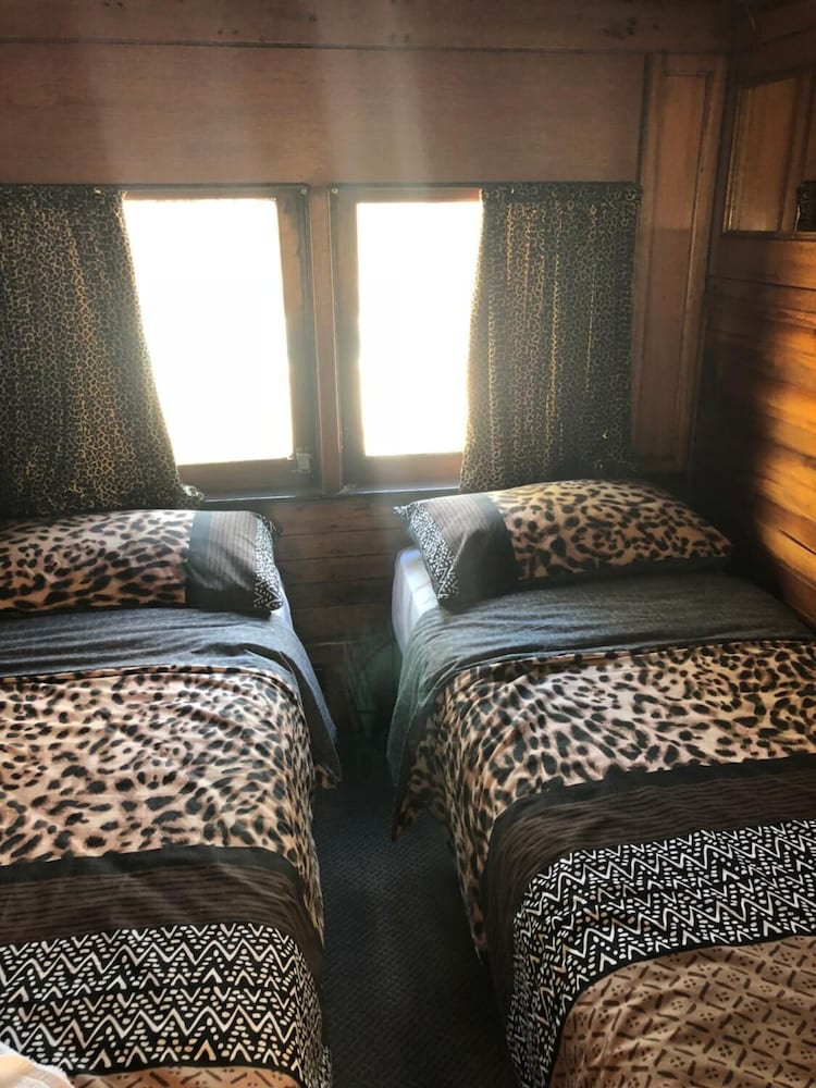 Krinklewood Cottage and Train Carriages
