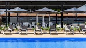 Outdoor pool, free cabanas, pool umbrellas