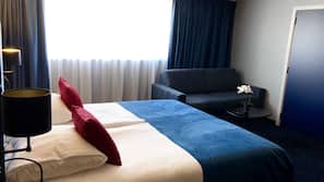Een minibar, verduisterende gordijnen, gratis wifi, beddengoed
