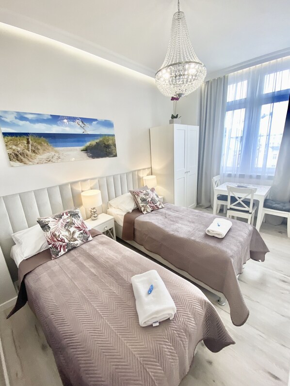 Comfort Quadruple Room, Private Bathroom | Primary image