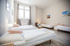 Family Room, Shared Bathroom | In-room safe, iron/ironing board, free WiFi, bed sheets