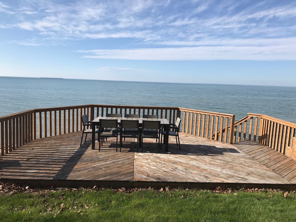Updated Cottage With Large Deck & Private Lakefront on Caseville's Sand