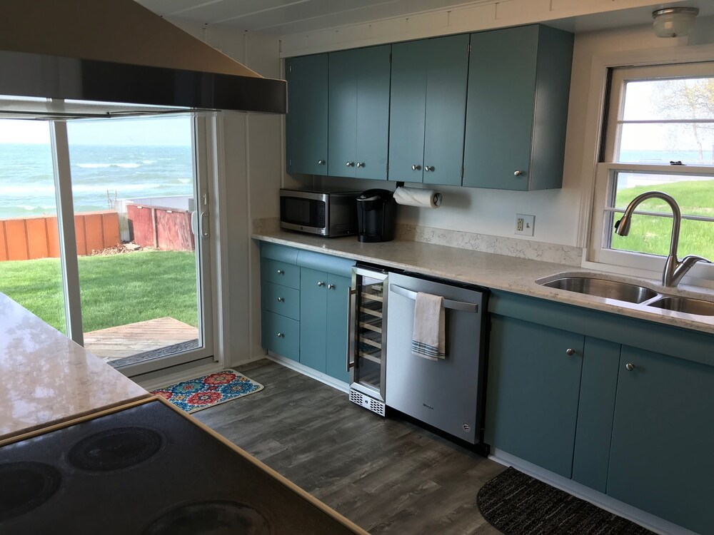 Updated Cottage with Large Deck & Private Lakefront on Caseville's Sand