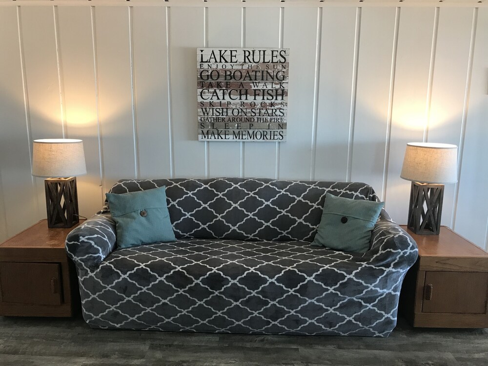 Updated Cottage with Large Deck & Private Lakefront on Caseville's Sand