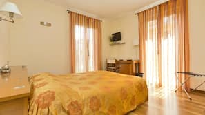Premium bedding, down comforters, minibar, in-room safe