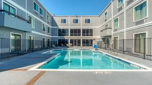 Outdoor pool, pool umbrellas, sun loungers