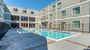 Outdoor pool, pool umbrellas, sun loungers