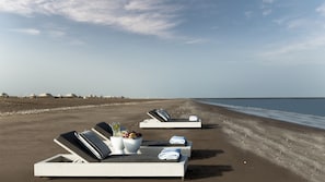 Private beach, black sand, beach volleyball