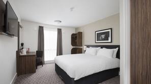 Desk, blackout curtains, free cots/infant beds, free WiFi