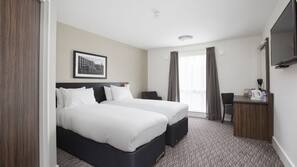 Desk, blackout curtains, free cots/infant beds, free WiFi