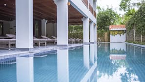 Indoor pool, open 7 AM to 9 PM, pool umbrellas, sun loungers