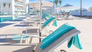 Outdoor pool, pool umbrellas, pool loungers