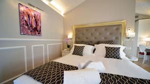 Down comforters, memory foam beds, in-room safe, desk