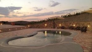 Seasonal outdoor pool, pool umbrellas, pool loungers