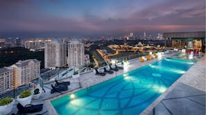 Outdoor pool, open 9:00 AM to 9:00 PM, pool loungers