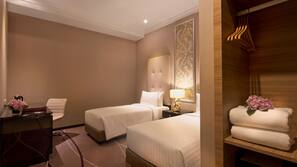 Down duvet, pillow top beds, minibar, in-room safe