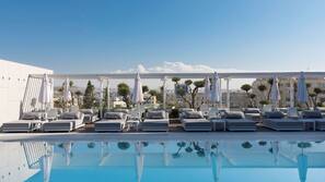 Seasonal outdoor pool, open 9 AM to 7:00 PM, free cabanas