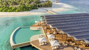 Outdoor pool, open 6 AM to 8 PM, pool umbrellas, pool loungers