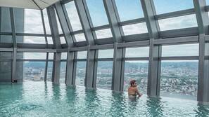 Outdoor pool, open 7:00 AM to 9:00 PM, pool umbrellas, sun loungers