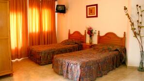 In-room safe, desk, blackout drapes, free cribs/infant beds