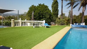 Outdoor pool, pool umbrellas, pool loungers