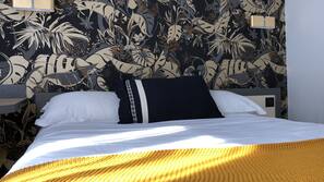 Desk, blackout curtains, soundproofing, free cots/infant beds