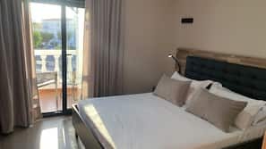 Premium bedding, down comforters, memory foam beds, minibar