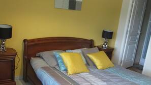 Blackout curtains, iron/ironing board, free cots/infant beds