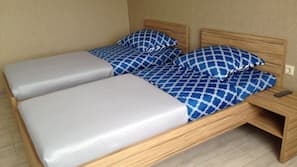 Premium bedding, desk, laptop workspace, iron/ironing board