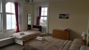 Desk, iron/ironing board, free cribs/infant beds, bed sheets