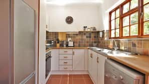 Full-sized fridge, oven, hob, dishwasher