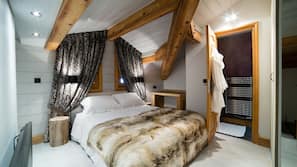 2 chambres, coffre-forts dans les chambres, fer et planche à repasser