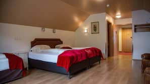 Hypo-allergenic bedding, blackout drapes, iron/ironing board, free WiFi