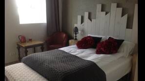 Blackout drapes, iron/ironing board, free WiFi, linens