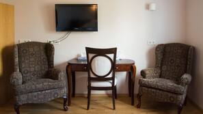 Desk, laptop workspace, blackout drapes, free cribs/infant beds