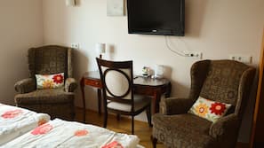 Desk, laptop workspace, blackout drapes, free cribs/infant beds