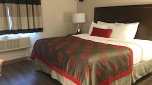 Premium bedding, memory-foam beds, desk, laptop workspace